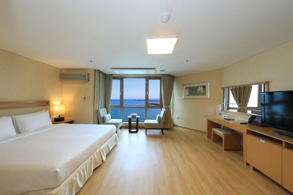 Ocean Suites Jeju Hotel Rum bild